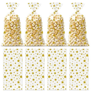 Detail of transparent gift bags with gold star patterns for cookies and small snacks