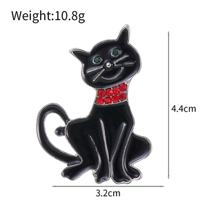 Cartoon black cat enamel brooch with red and green rhinestones, 4.4cm height