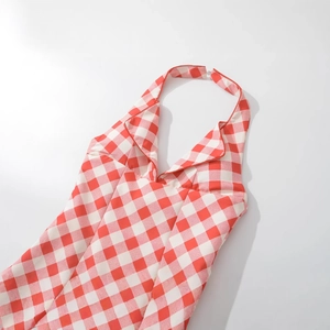 Fashionable red gingham halter neck A-line backless mini dress in a flat lay view