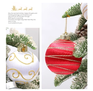 Close-up of 8cm silk fiber Christmas balls with gold glitter patterns and hanging ropes