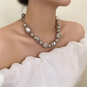 Chic silver irregular liquid metal bead necklace for a minimalist look on collarbone