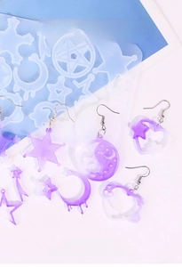 Detail of star and moon resin silicone molds for DIY earrings with purple pendants