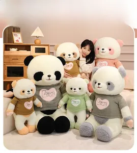 Collection of plush panda toys in various colors wearing knitted sweaters with love heart motifs