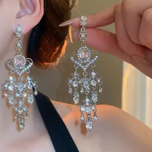 Elegant silver heart earrings with pink oval crystal and sparkling tassel fringe drops