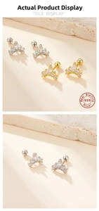 Detail of silver and gold crown stud earrings with micro-set zircon and screw backs