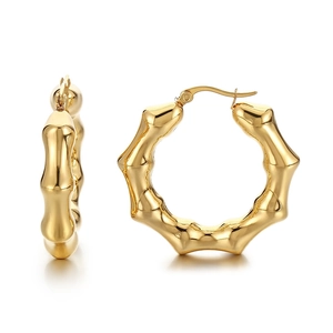 Polished gold U-shaped bamboo hoop earrings made of vacuum plated stainless steel