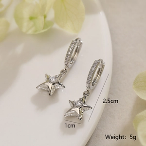 Macro view of silver star drop earrings with cubic zirconia and size specifications