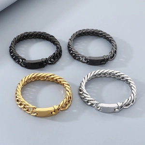 Detailed view of 12mm stainless steel Cuban link bracelets in gold, silver, black, and grey
