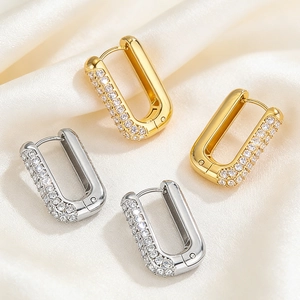 U-shaped stainless steel earrings with cubic zirconia inlay in gold and silver finish