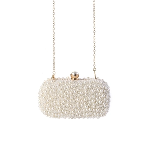 Elegant handmade pearl clutch with gold chain strap for luxury party and wedding