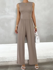 Women's khaki sleeveless wide leg jumpsuit with ribbed texture and waist tie design