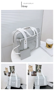 Grey Japanese JK uniform Ita bag featuring a heart-shaped clear window and shoulder straps
