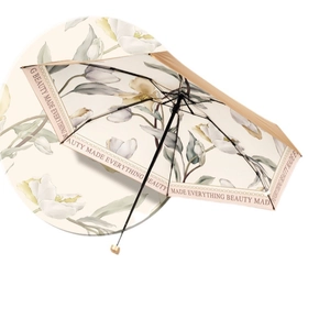 Flat six-fold mini sun umbrella in beige with champagne gold trim and windproof ribs