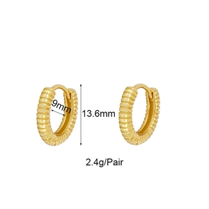 Detailed view of gold textured huggie earrings with 9mm inner diameter dimensions