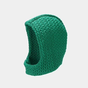 Detailed view of the bright green quilted texture on this thermal winter trapper hat