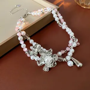French style double-layer pearl necklace with floral charms and resin waterdrop pendant
