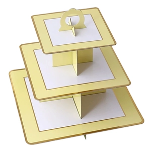Three-tier square cardboard cupcake stand with elegant gold foil edges and a handle