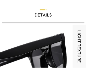 Detail showing the light texture and polished frame of black sunglasses, model 017-136