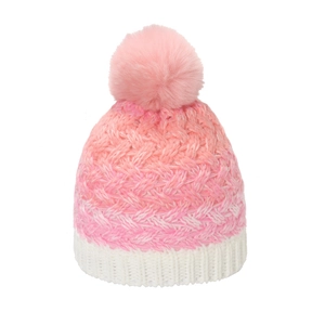 Detail of gradient pink knit beanie with thick cable weave and soft fluffy pompom