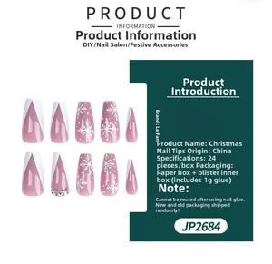 Christmas press-on nails set featuring pink base with white snowflakes and rhinestone details