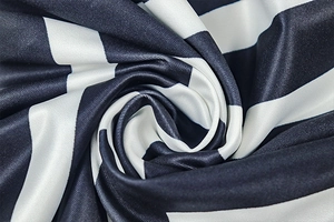 Macro shot of striped V-neck maxi dress fabric showing its soft texture and elasticity