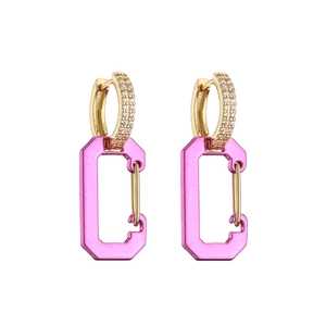 Detail of pink enamel carabiner earrings with gold plating and cubic zirconia pavé