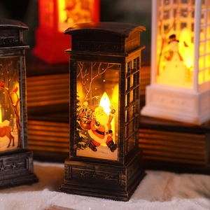Close-up of vintage Christmas telephone booth lanterns with LED warm glowing lights