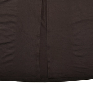 Close-up of high-quality dark brown jersey fabric with detailed high slit and hem stitching