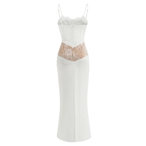 Exquisite back view of white lace patchwork on a slim fit evening dress with V-cut detail