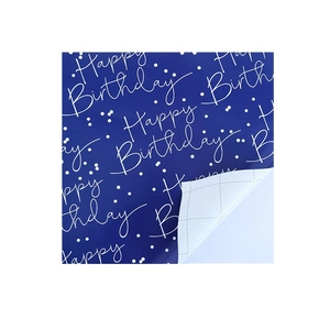 Dark blue Happy Birthday self-adhesive wrapping paper with grid lines on back