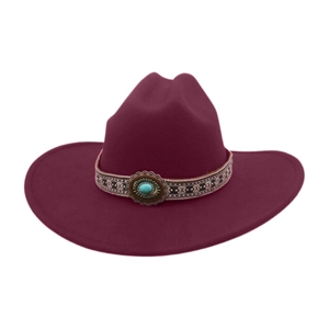 Close-up of burgundy wool fedora with ethnic woven band and turquoise stone accessory