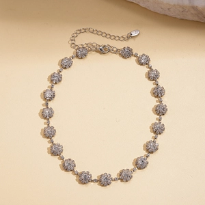 Detail of silver floral rhinestone necklace with adjustable chain and lobster clasp closure