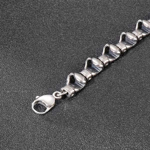 Gothic skull link bracelet in silver stainless steel with heavy duty lobster clasp design