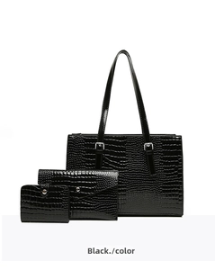 Three-piece black crocodile embossed bag set including a large tote and pouches