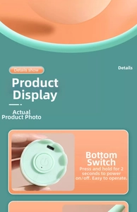 Detail view of the mint green pet toy base with Type-C charging port and power button