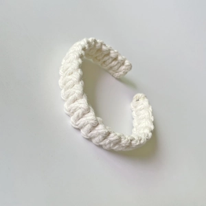 Handmade bohemian white cotton braided curtain tieback with minimalist woven texture
