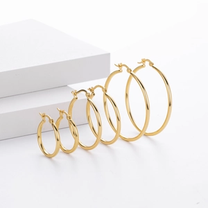Polished S925 sterling silver hollow hoop earrings in gold finish with multi-size options