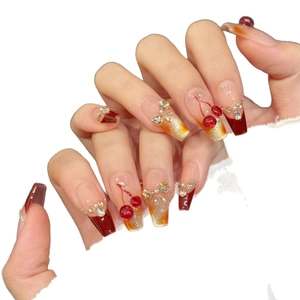 Handmade cherry wine red press-on nails with 3D cherry accents and cat-eye glitter