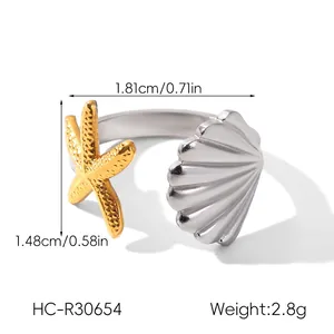 Detailed view of bicolor starfish and shell open ring with dimensions and weight
