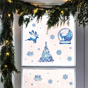 Blue Christmas window clings with reindeer and snowflakes for festive glass decoration