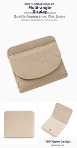 Detail of minimalist beige leather wallet showing 180-degree flat opening and card slots