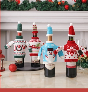 Detailed view of knitted Christmas wine bottle sweater with Merry Christmas embroidery