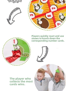 Close-up of numbered insect target cards and blowpipe for the lizard tongue board game