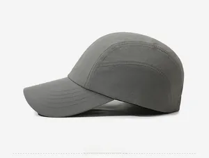 Detail view of quick-dry fabric and precise stitching on the dark grey sports cap