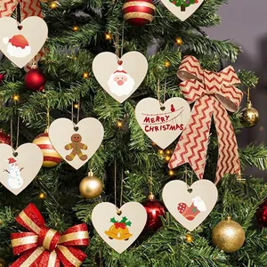 Heart-shaped wooden Christmas ornaments featuring Santa and Snowman for holiday tree decor