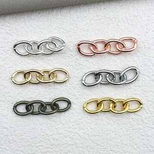 Detail of four-link metal chain connectors in various metallic finishes for DIY jewelry making