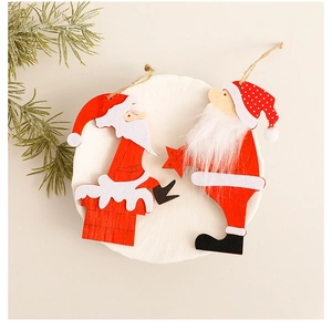 Close-up of wooden Santa Claus ornaments with fiber beards and natural jute twine hangers