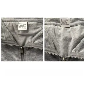 Detail of grey sportswear tag showing 100% polyester material and washing instructions