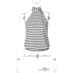 Close-up of black and white striped halter knit vest featuring a high-neck sleeveless design
