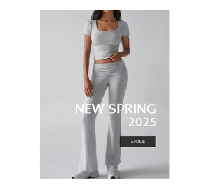 Detail view of grey short crop top and high-waisted flared pants set for women